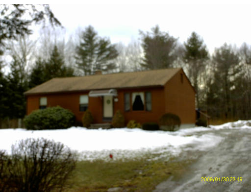 6 Partridge Hill Road Charlton, MA 01507 - Photo 1 of 6 a street view with large trees