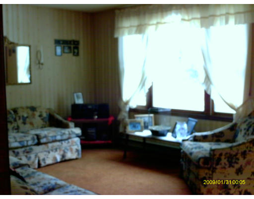 6 Partridge Hill Road Charlton, MA 01507 - Photo 5 of 6 a living room with furniture and a window