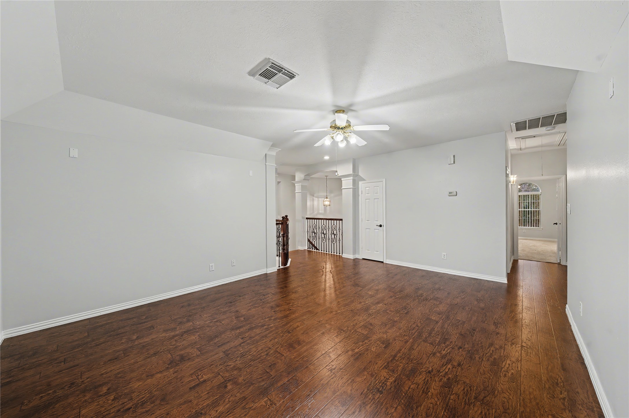 5403 Emerald Pointe Lane Sugar Land, TX 77479 - Photo 39 of 50 a view of an empty room with wooden floor