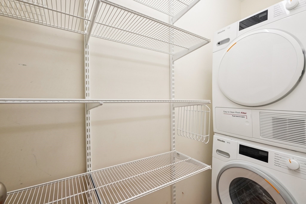 20 Chapel Street, Unit B811 Brookline, MA 02446 - Photo 31 of 41 a view of a storage & utility room with wooden floor
