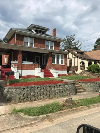 front view of a house with a street