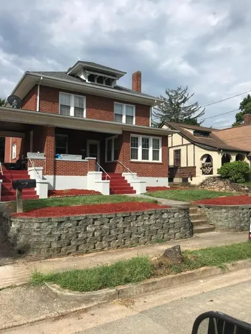 front view of a house with a street