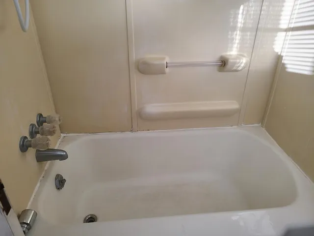 a bathroom with a bathtub
