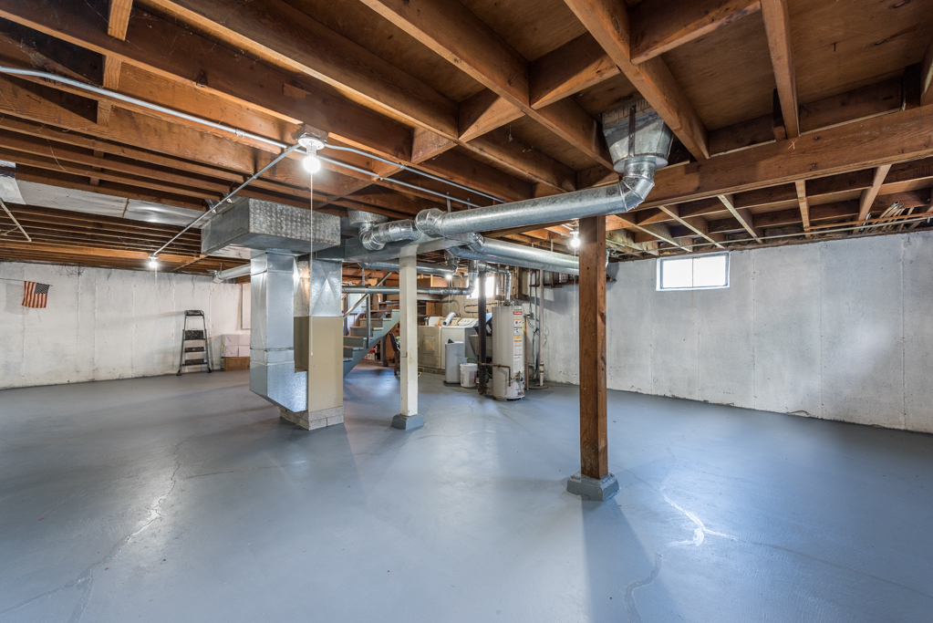 1636 Rice Street Waukegan, IL 60087 - Photo 20 of 26 a view of water heater room with wooden roof