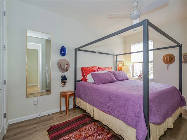 a bed room with a bed and a window