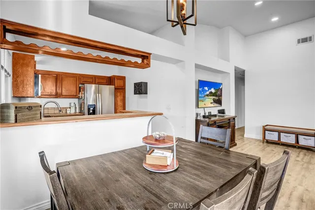 a living room with dining table