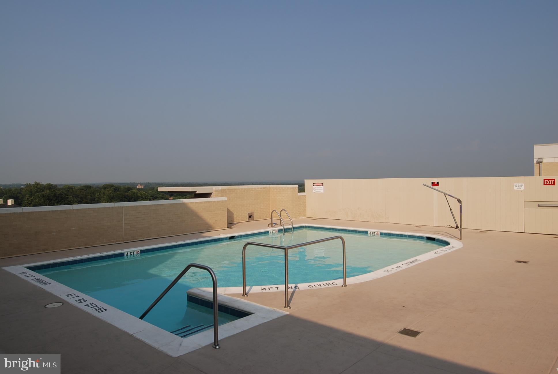 11800 Sunset Hills Road, Unit 712 Reston, VA 20190 - Photo 29 of 35 Rooftop pool with indoor men's and womens shower