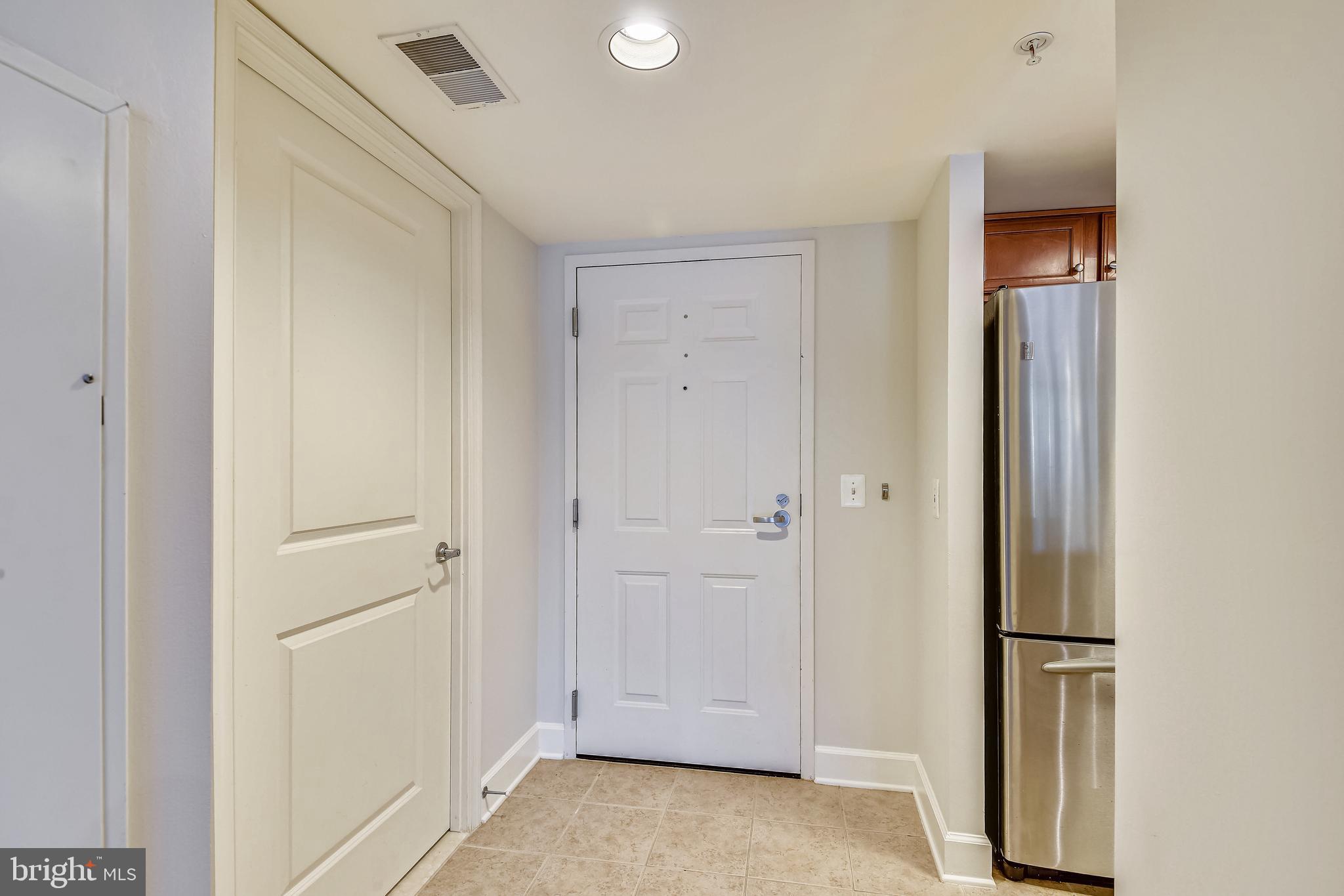 11800 Sunset Hills Road, Unit 712 Reston, VA 20190 - Photo 7 of 35 Entry with spacious coat closet