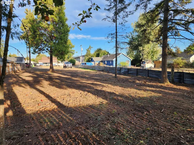 a view of street with houses