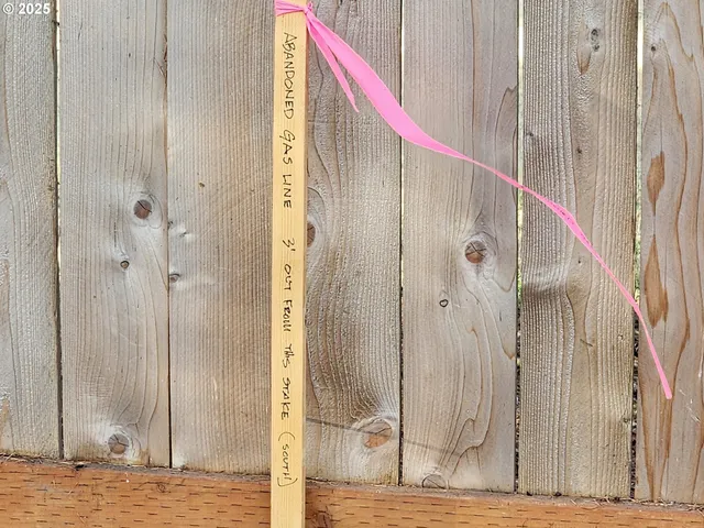 a bathroom with a shower and a door