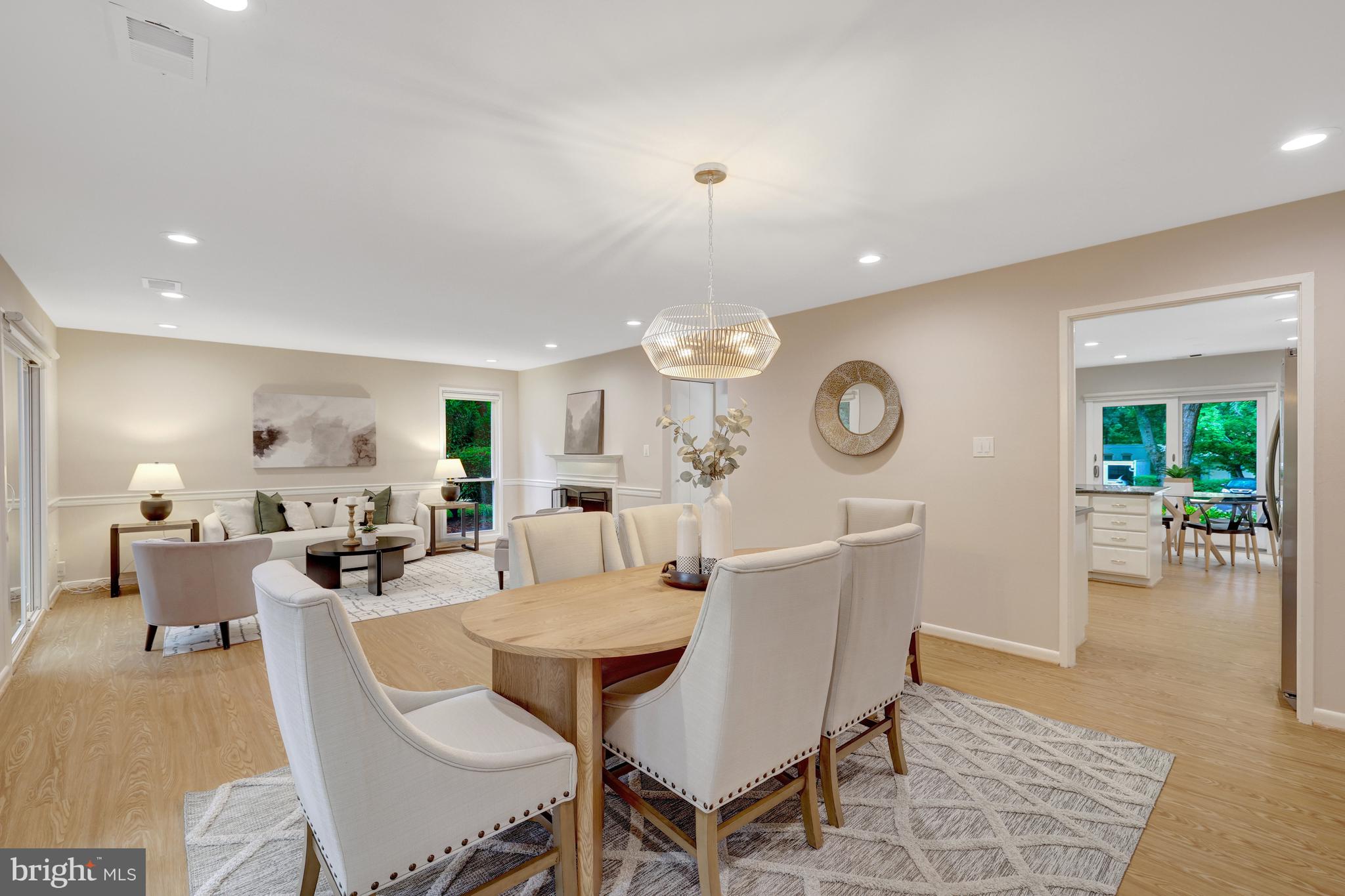 1600 Wainwright Drive Reston, VA 20190 - Photo 13 of 55 The dining room also opens to the kitchen.
