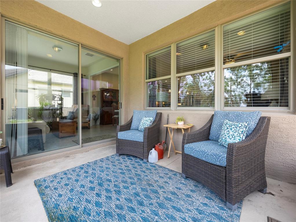 7807 Southwest 97th Circle Ocala, FL 34481 - Photo 39 of 50 a living room with furniture and a large window