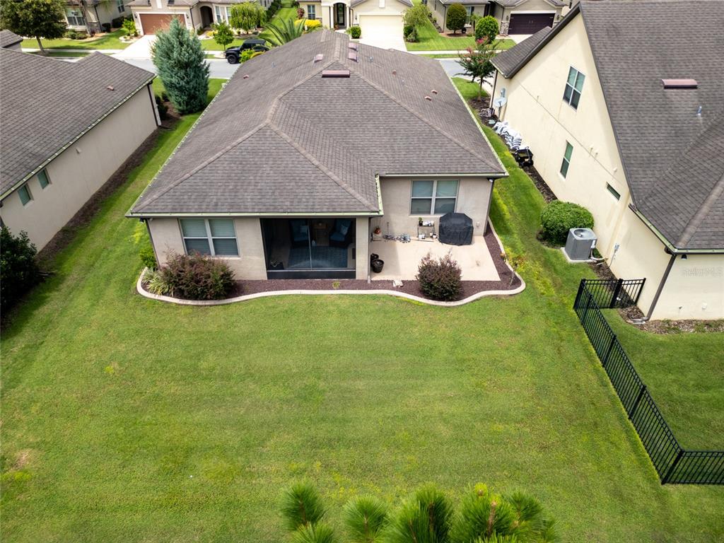 7807 Southwest 97th Circle Ocala, FL 34481 - Photo 44 of 50 a front view of a house with garden