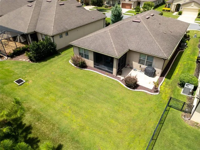swimming pool view with a outdoor seating space