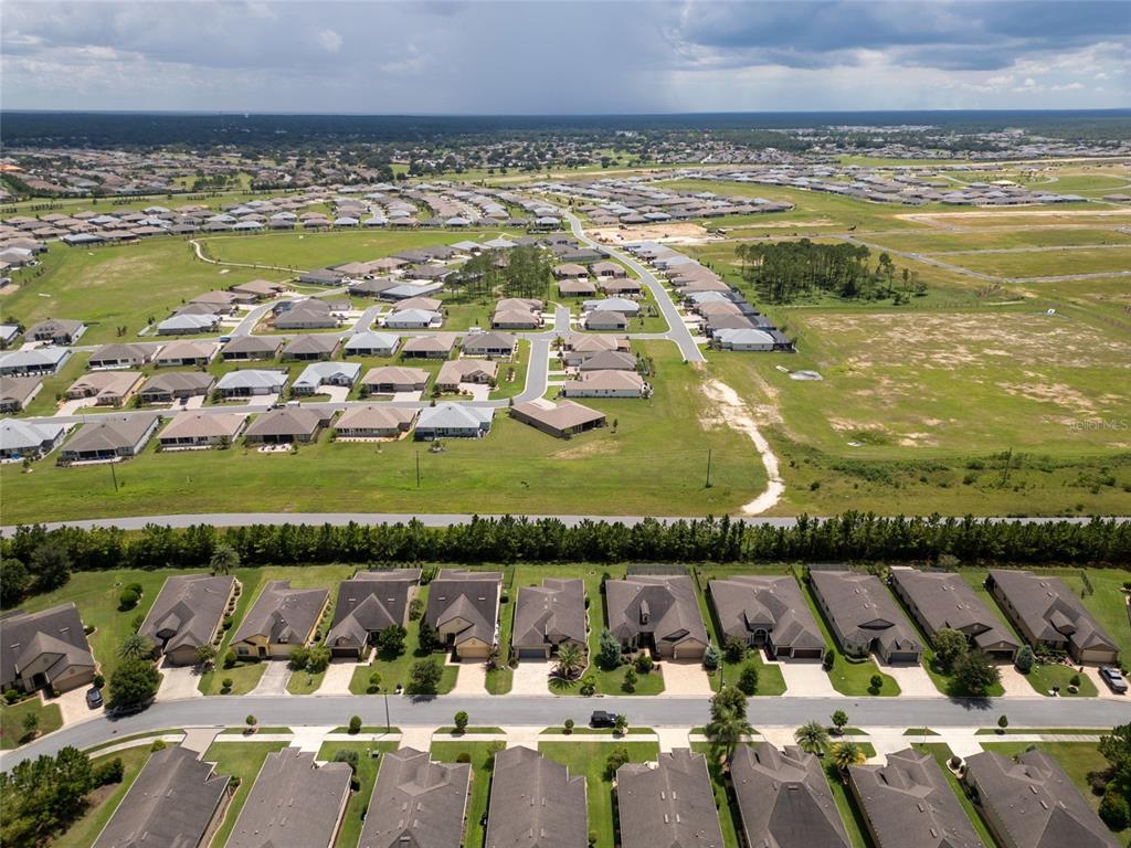 7807 Southwest 97th Circle Ocala, FL 34481 - Photo 49 of 50 a view of swimming pool and an outdoor seating