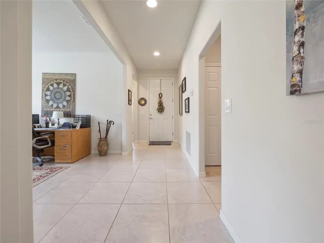 a view of a big room with closet and a window