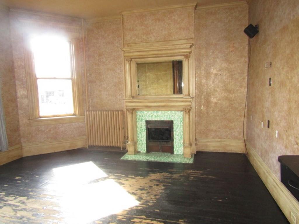 246 West Main Street Uniontown, PA 15401 - Photo 11 of 42 a view of a livingroom with a fireplace