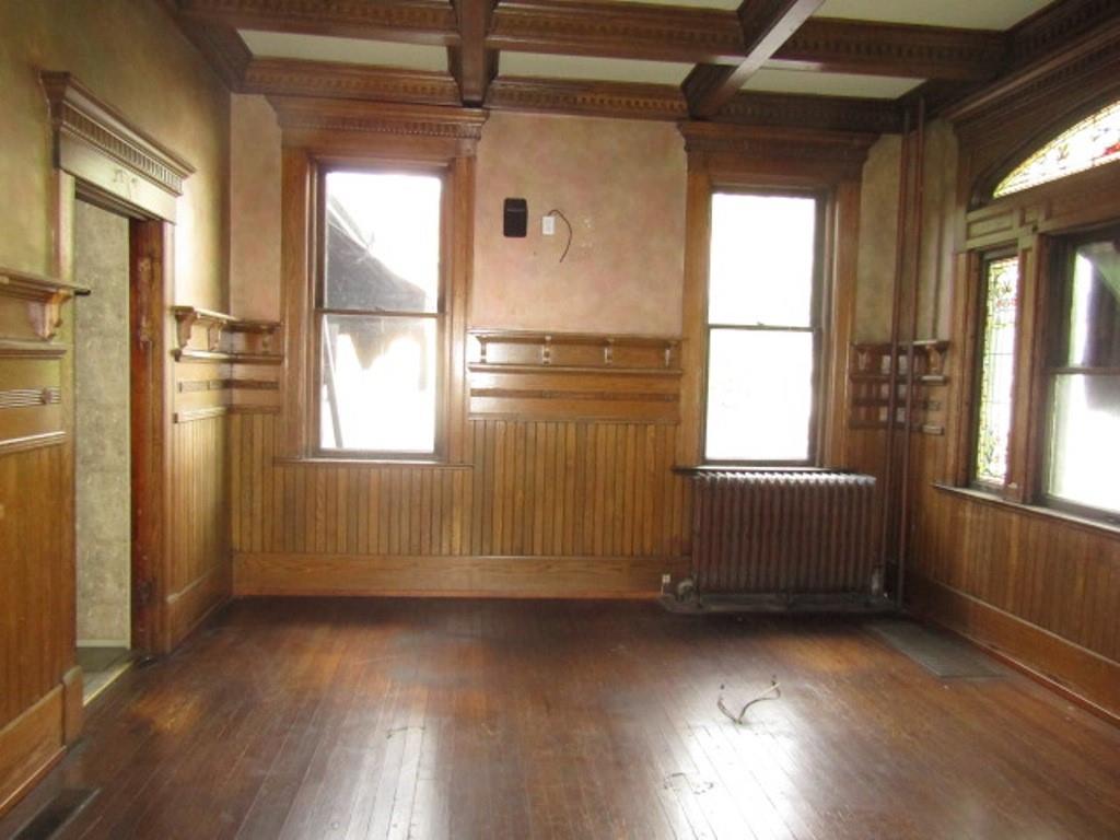 246 West Main Street Uniontown, PA 15401 - Photo 14 of 42 a view of room with window and wooden floor