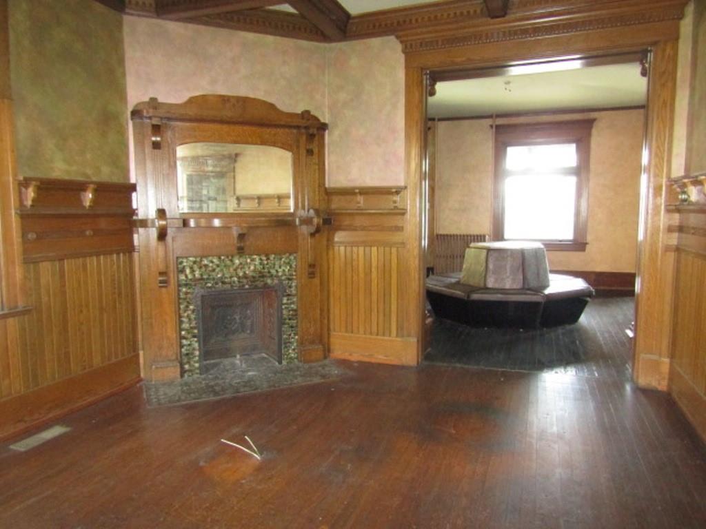 246 West Main Street Uniontown, PA 15401 - Photo 15 of 42 a living room with furniture and a fireplace
