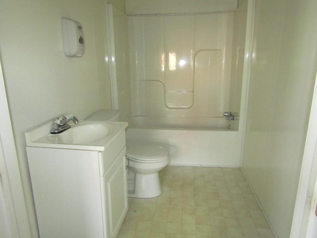 246 West Main Street Uniontown, PA 15401 - Photo 20 of 42 a bathroom with a sink a toilet and shower
