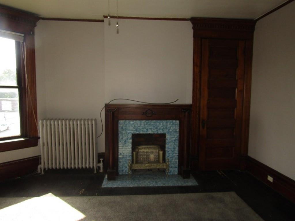 246 West Main Street Uniontown, PA 15401 - Photo 24 of 42 a living room with a fireplace