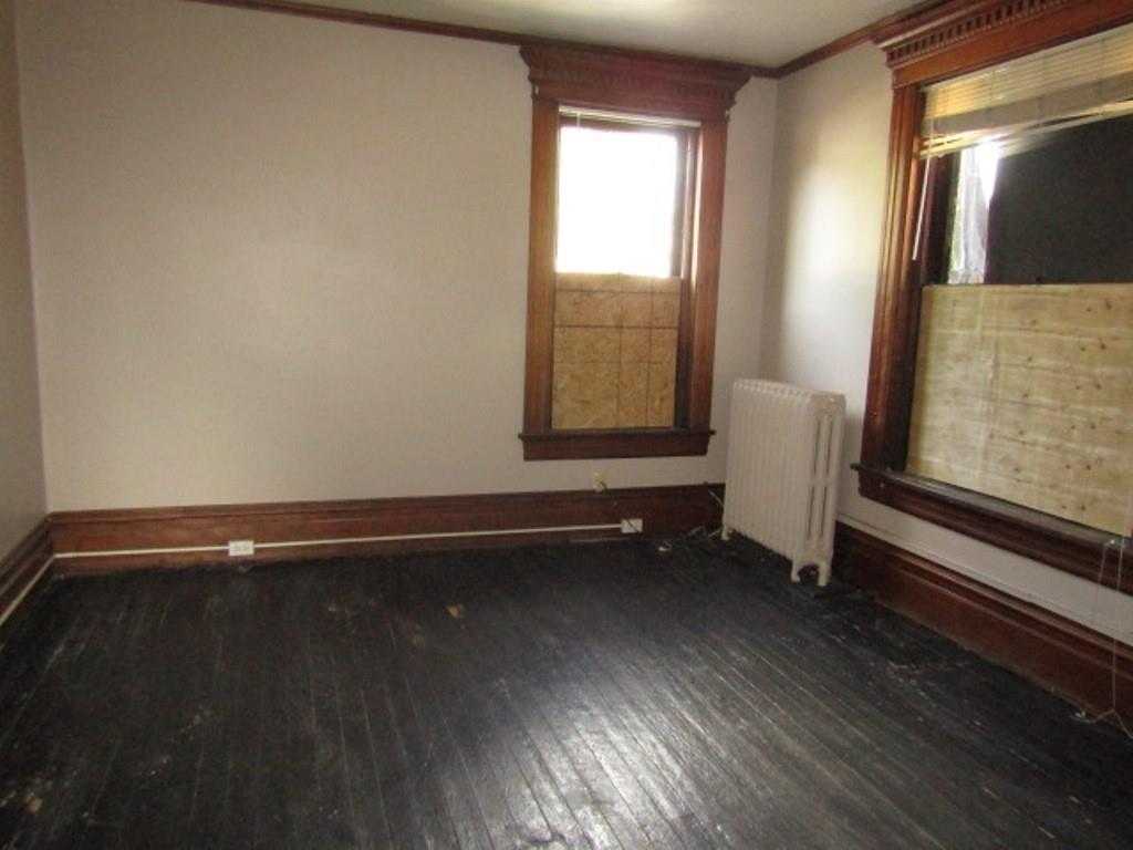 246 West Main Street Uniontown, PA 15401 - Photo 28 of 42 a view of room with window and wooden floor