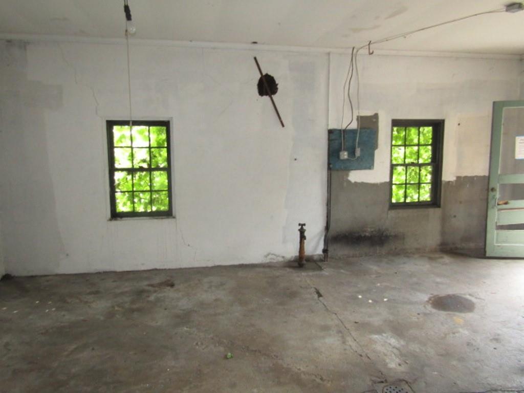 246 West Main Street Uniontown, PA 15401 - Photo 8 of 42 a view of an empty room with a window