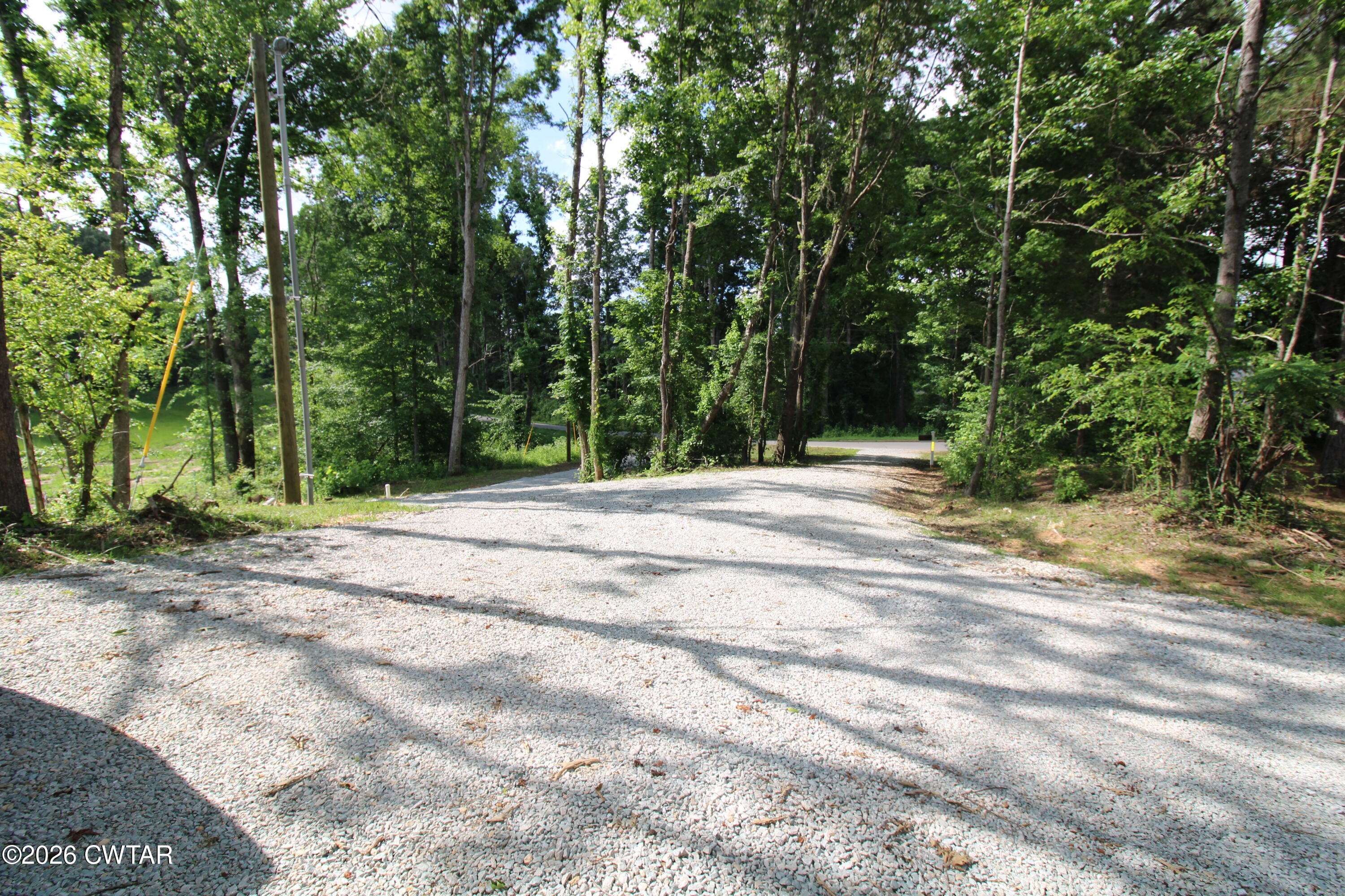 398 Pope Road Lexington, TN 38351 - Photo 18 of 21 a view of outdoor space with trees