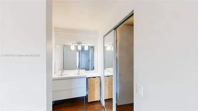 a bathroom with a toilet and a bathtub