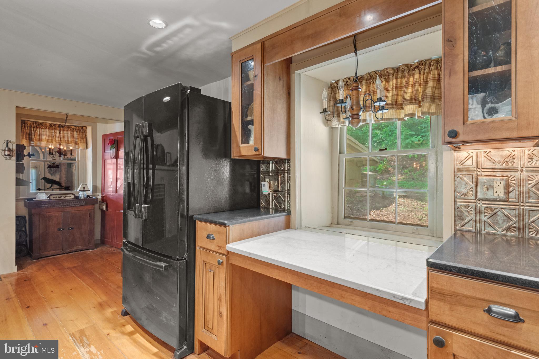 1592 White Oak Road Strasburg, PA 17579 - Photo 17 of 68 a kitchen with a refrigerator and a sink