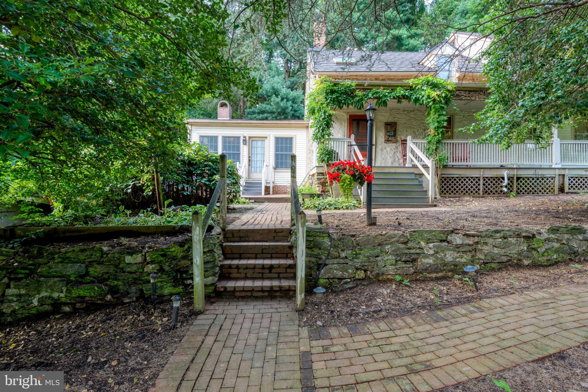 1592 White Oak Road Strasburg, PA 17579 - Photo 2 of 68 Charming home nestled in lush greenery.