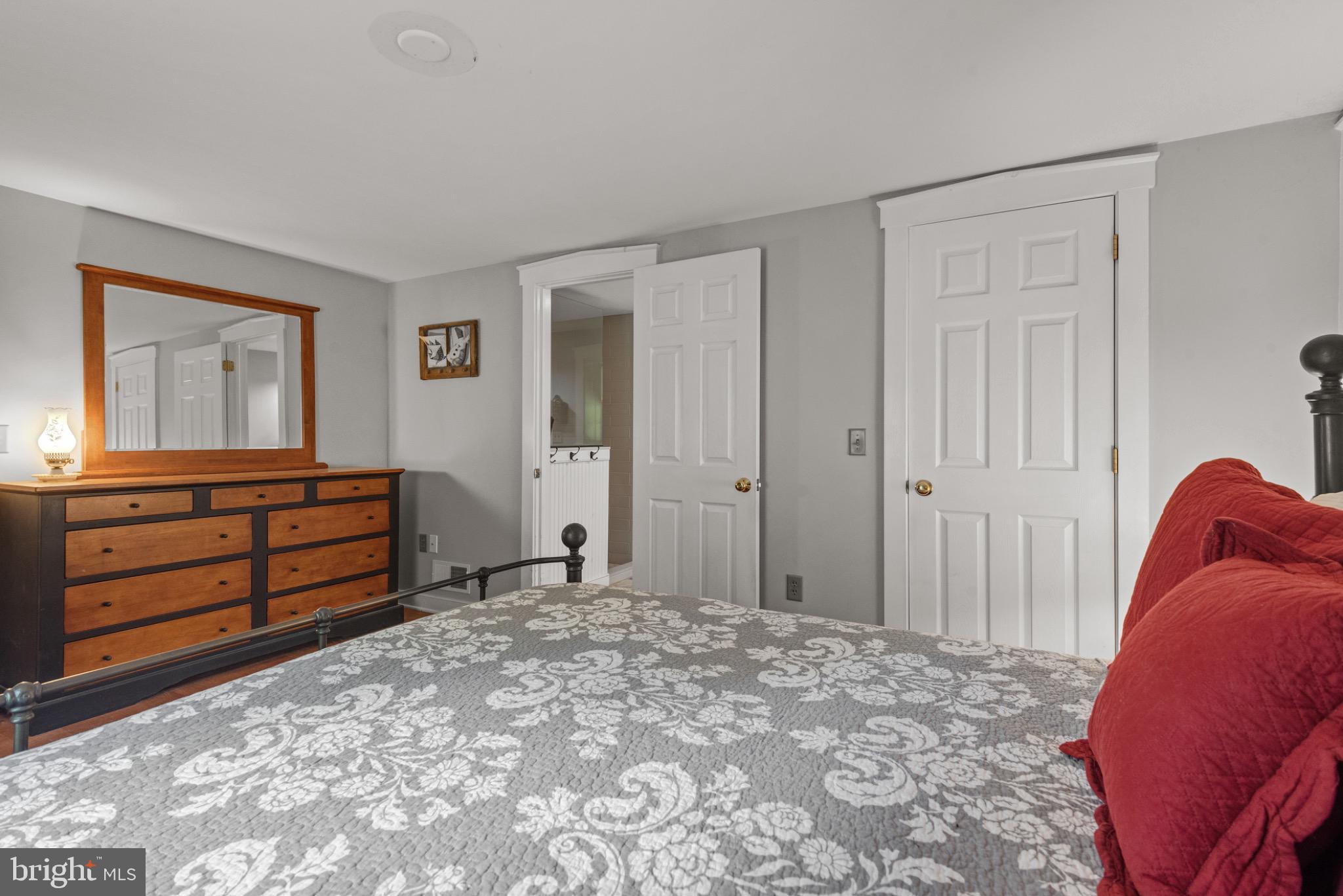 1592 White Oak Road Strasburg, PA 17579 - Photo 30 of 68 a bed room with a bed and a dresser