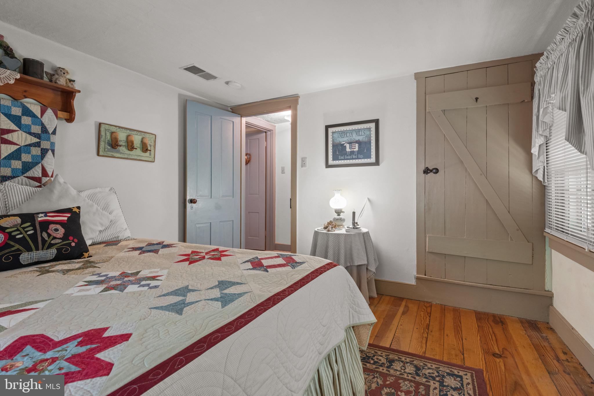 1592 White Oak Road Strasburg, PA 17579 - Photo 43 of 68 a bedroom with a bed and a dresser