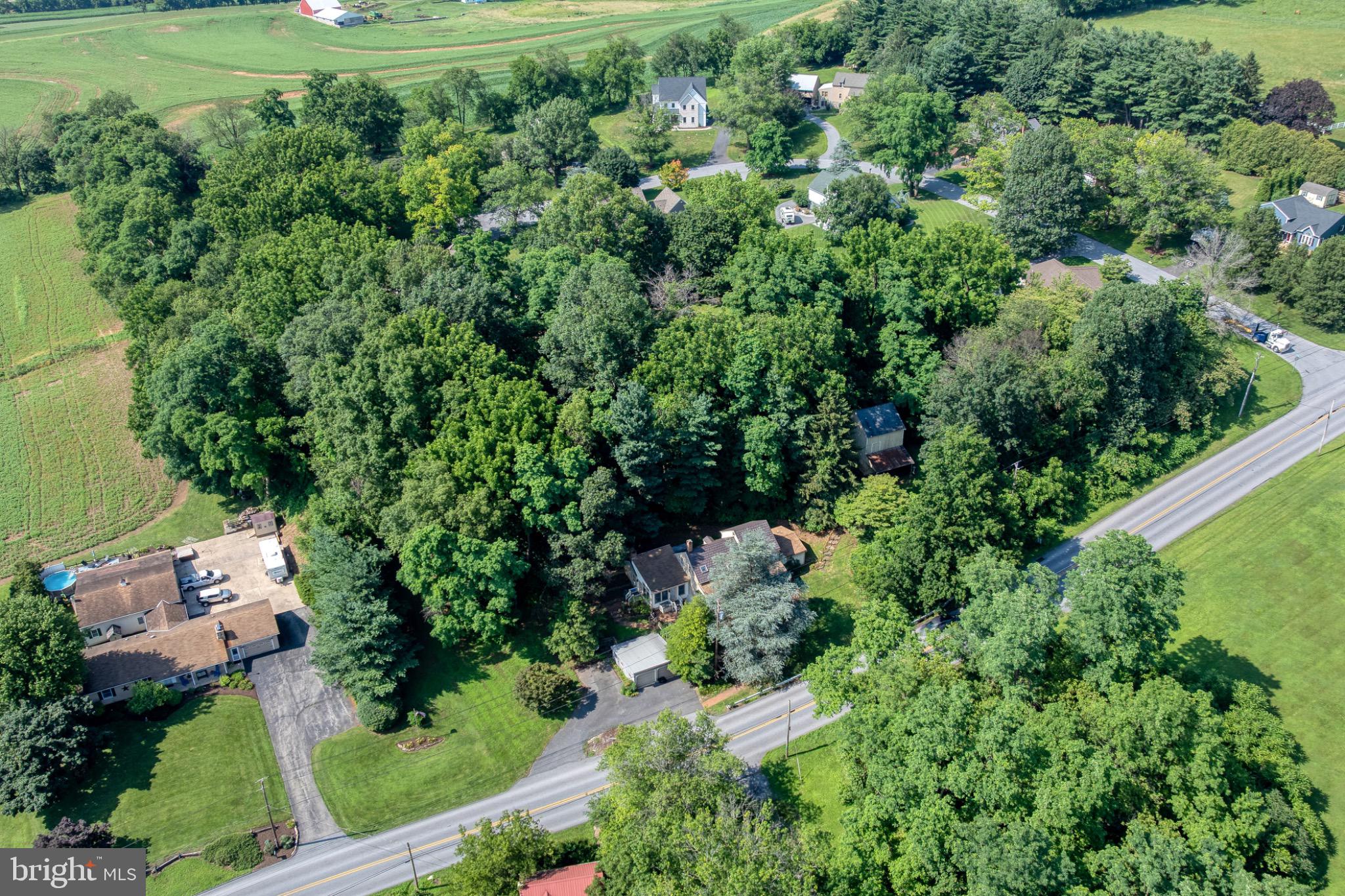 1592 White Oak Road Strasburg, PA 17579 - Photo 57 of 68 an aerial view of a house with a yard
