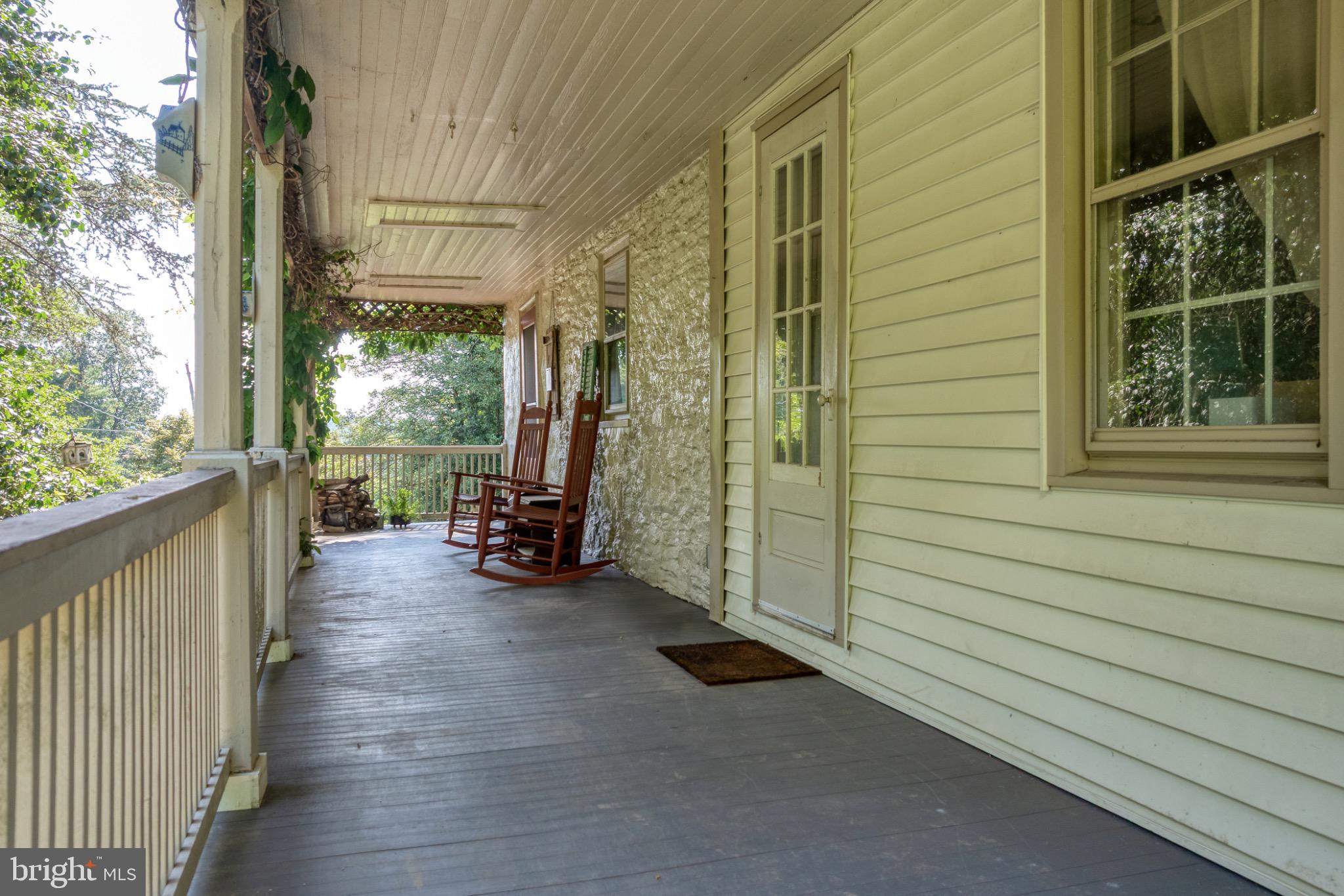 1592 White Oak Road Strasburg, PA 17579 - Photo 7 of 68 a view of a porch with wooden floor and furniture