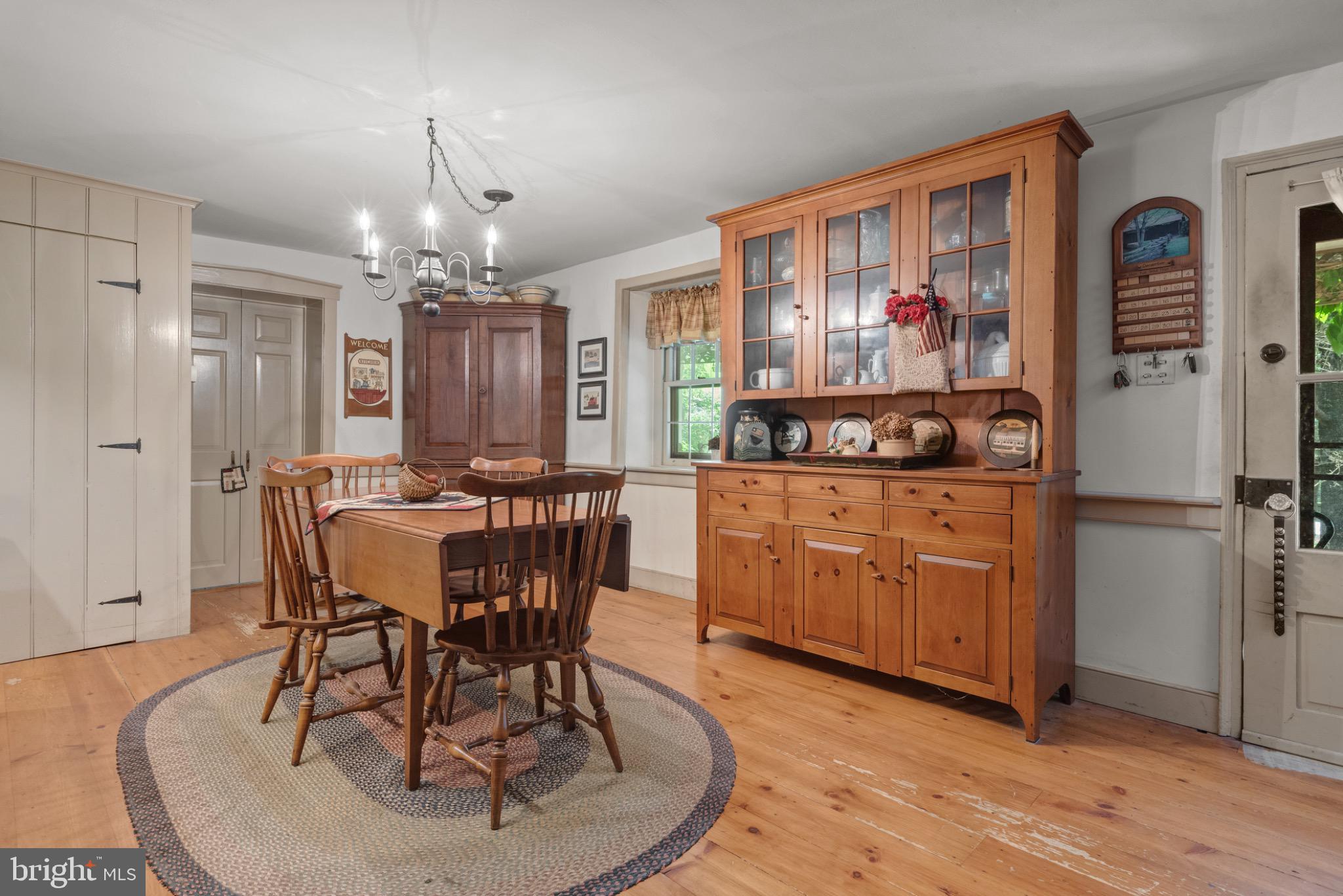 1592 White Oak Road Strasburg, PA 17579 - Photo 9 of 68 a view of a dining room with furniture window and wooden floor
