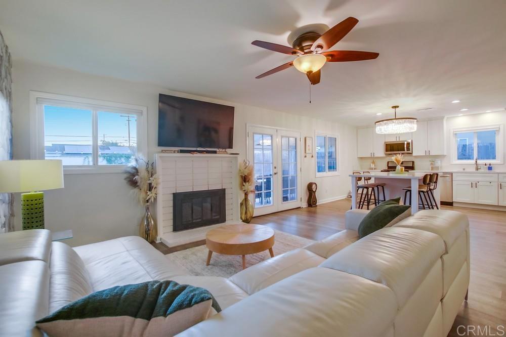 12930 Morene Street Poway, CA 92064 - Photo 19 of 26 a living room with furniture and a fireplace