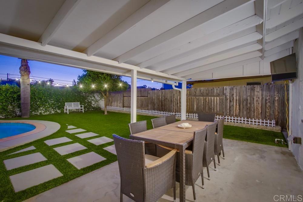 12930 Morene Street Poway, CA 92064 - Photo 7 of 26 a view of a patio with a table and chairs