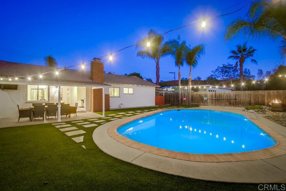 12930 Morene Street Poway, CA 92064 - Photo 8 of 26 a view of a swimming pool with outdoor seating