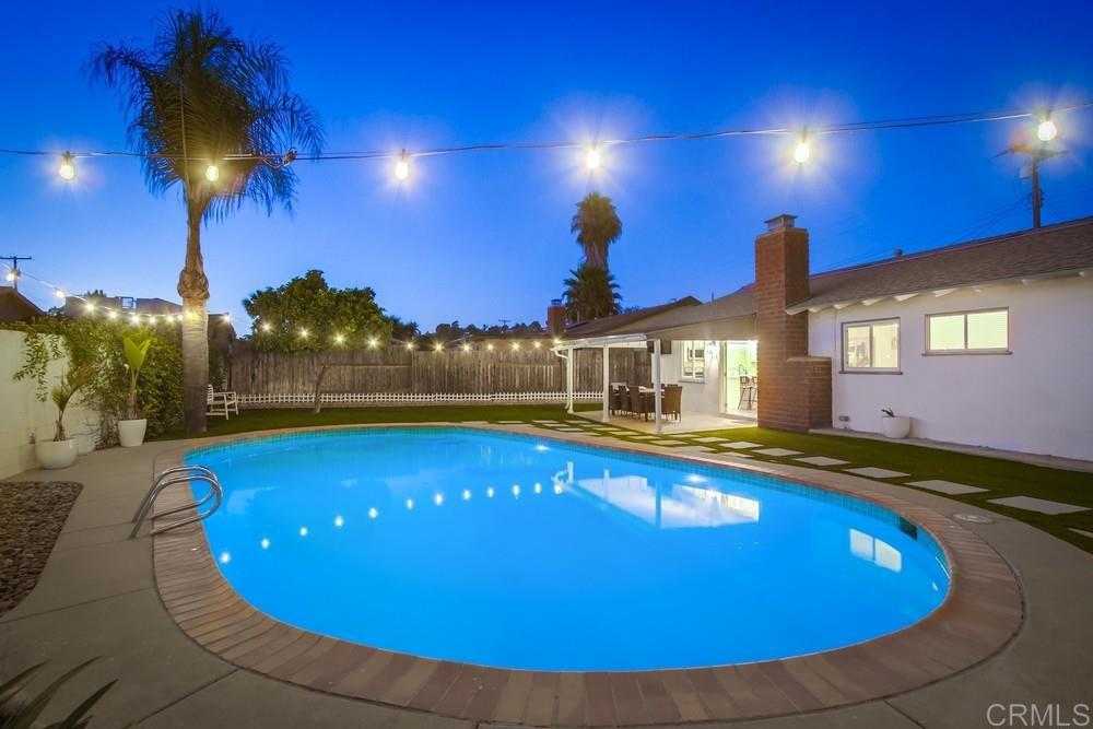 12930 Morene Street Poway, CA 92064 - Photo 9 of 26 a view of a swimming pool with an outdoor space and swimming pool