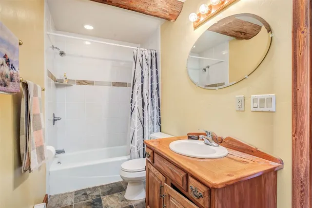 a view of living room filled with furniture