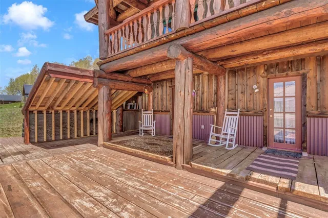 a view of a backyard with sitting area