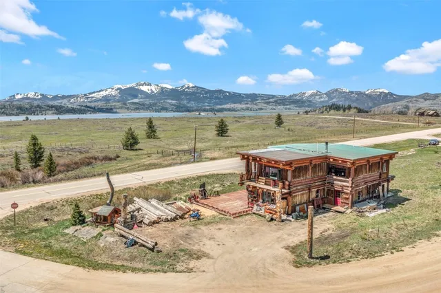 a view of an ocean and a mountain