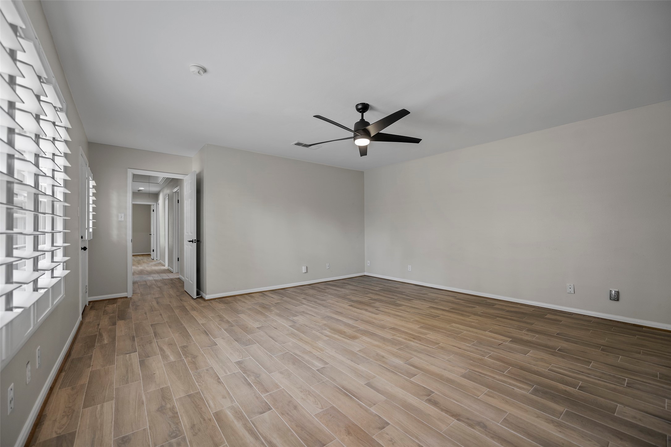 6507 Allentown Drive Spring, TX 77389 - Photo 11 of 30 View of the primary bedroom as seen from the bathroom.