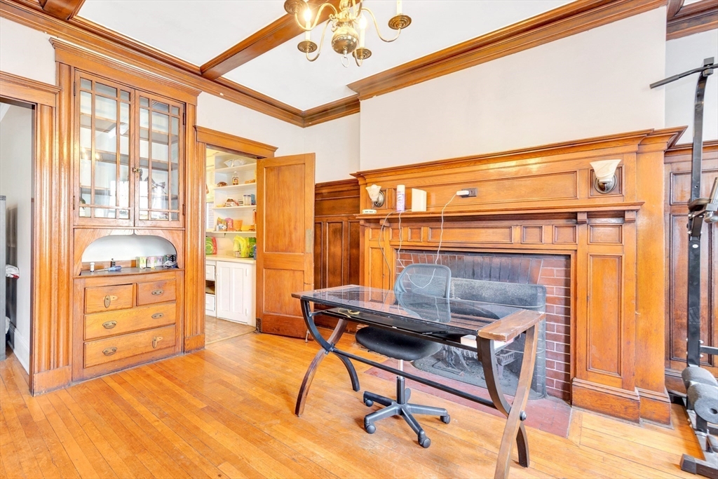 106 Strathmore Road Boston, MA 02135 - Photo 4 of 30 a bedroom with furniture and a window