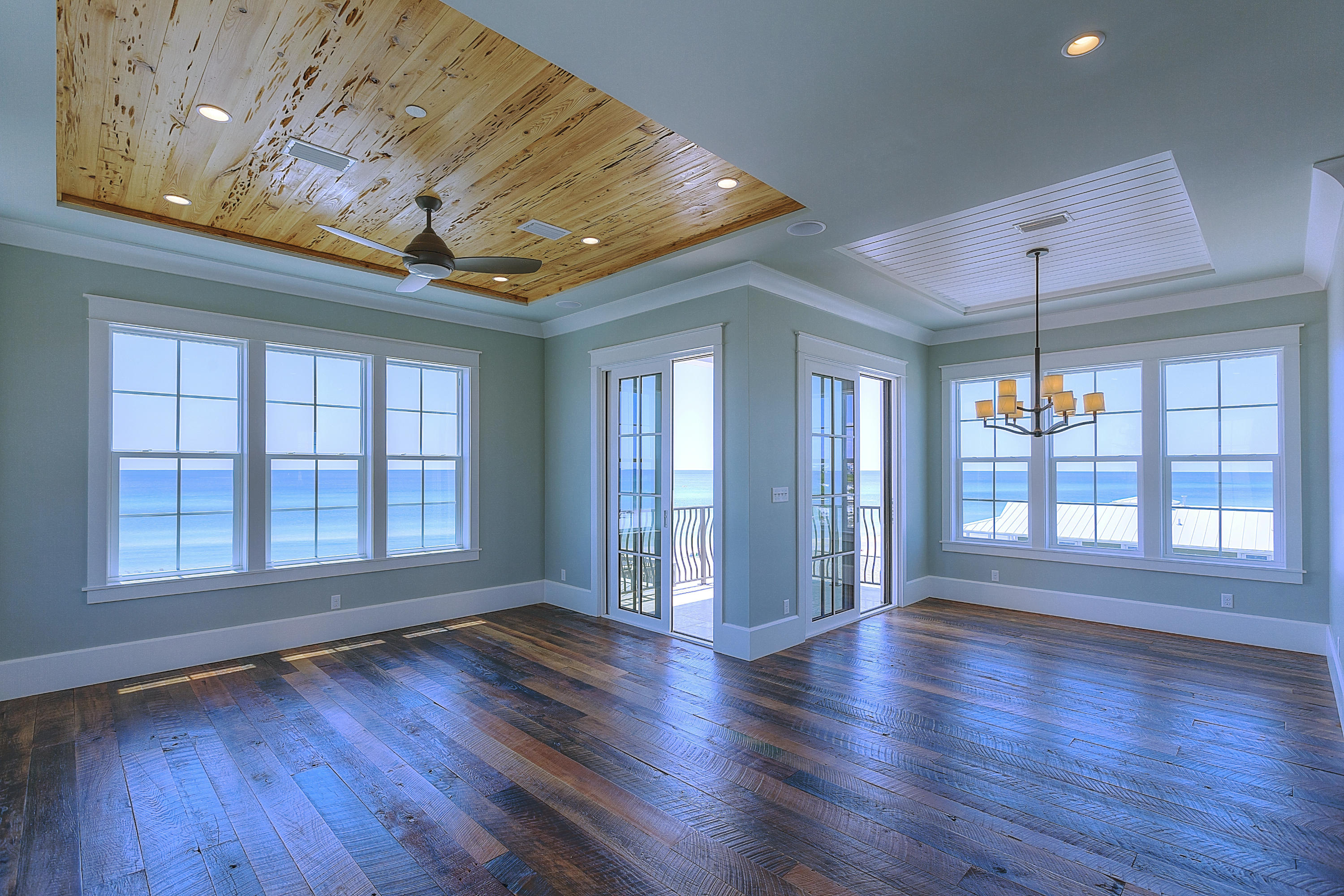 94 Emerald Cove Inlet Beach Inlet Beach, FL 32461 - Photo 12 of 21 a view of an empty room with wooden floor and a window