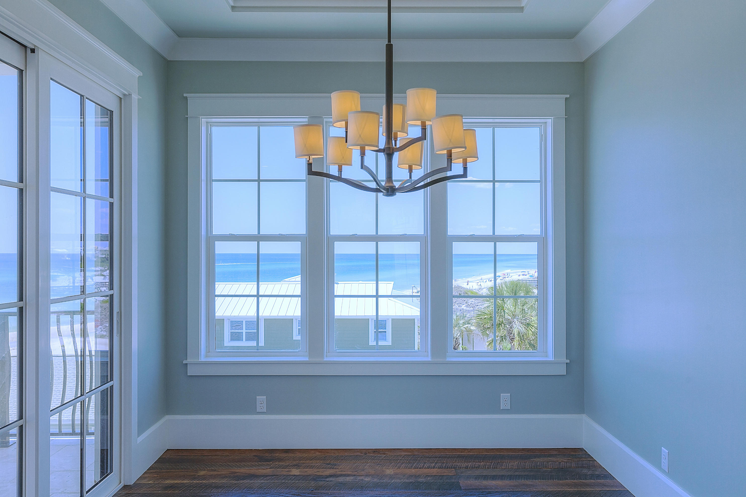94 Emerald Cove Inlet Beach Inlet Beach, FL 32461 - Photo 13 of 21 a view of empty room with wooden floor and fan