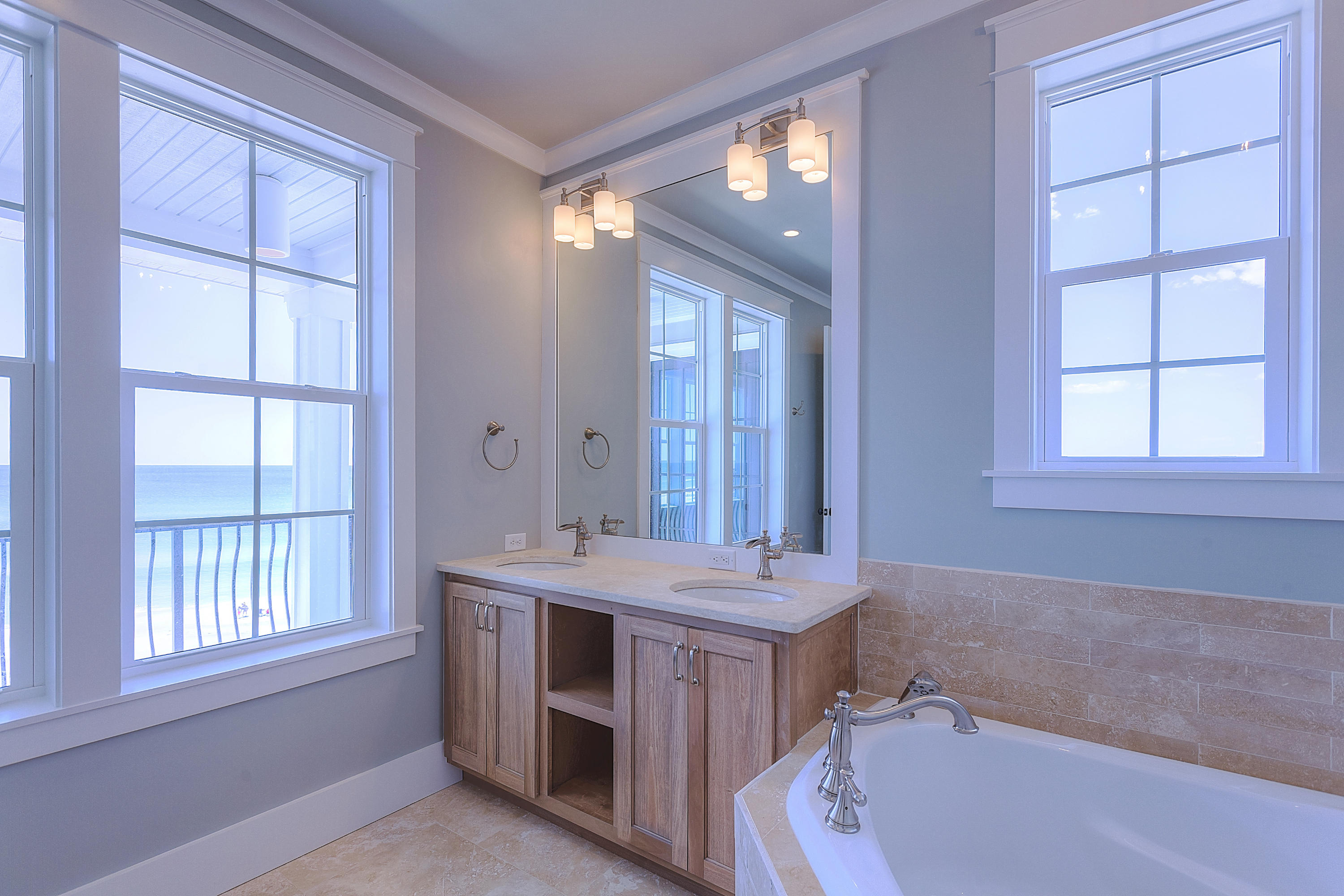 94 Emerald Cove Inlet Beach Inlet Beach, FL 32461 - Photo 17 of 21 a bathroom with a sink a vanity and a bathtub