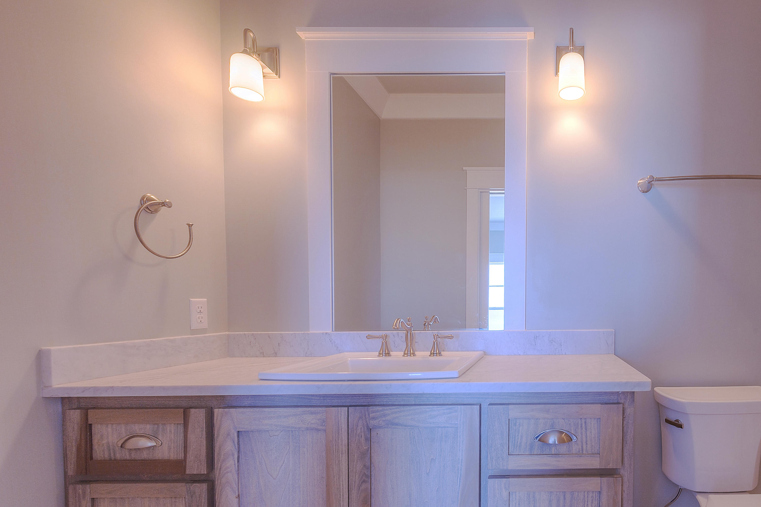 94 Emerald Cove Inlet Beach Inlet Beach, FL 32461 - Photo 8 of 21 a bathroom with a granite countertop sink a toilet and a mirror