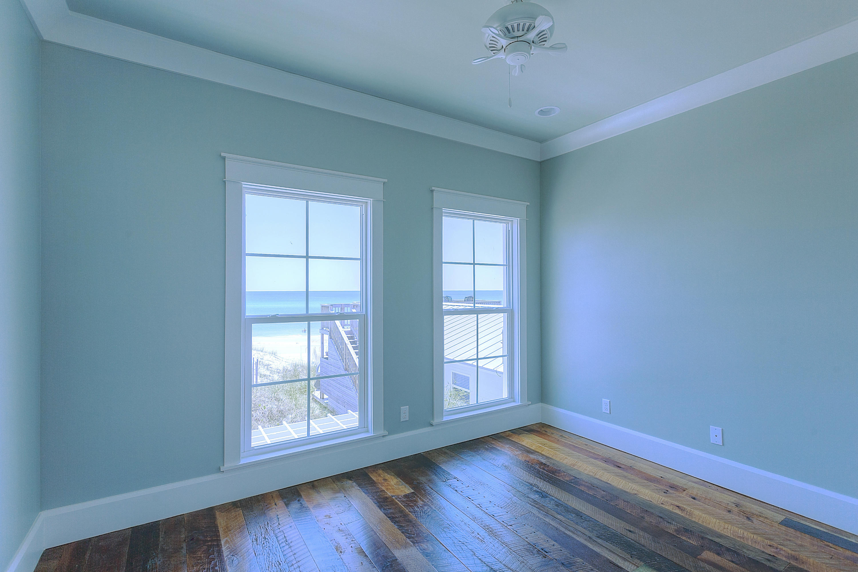 94 Emerald Cove Inlet Beach Inlet Beach, FL 32461 - Photo 9 of 21 a view of an empty room with wooden floor and a window
